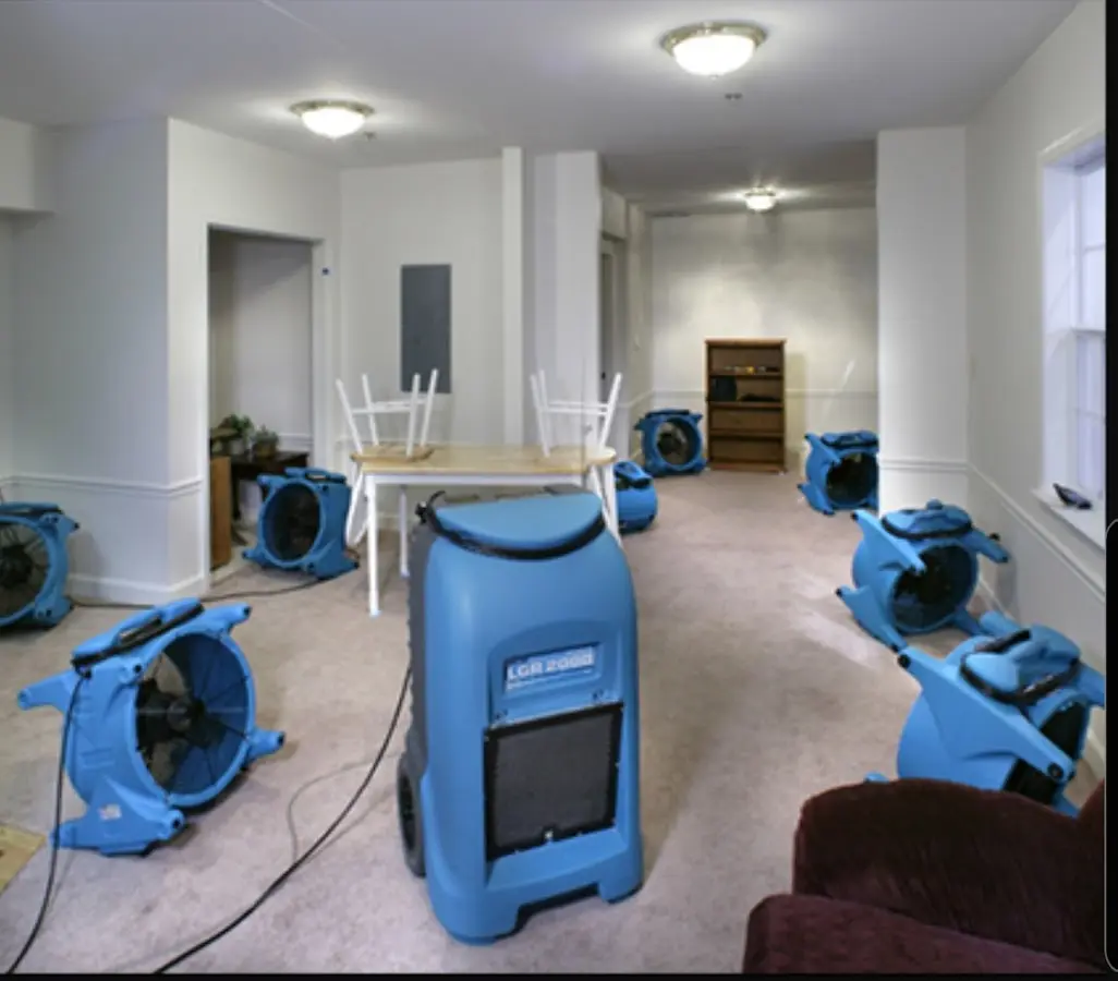 Air movers and dehumidifier setup for Water Damage Restoration in Woodstock